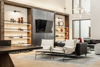 Luxurious clubhouse with sitting area and television